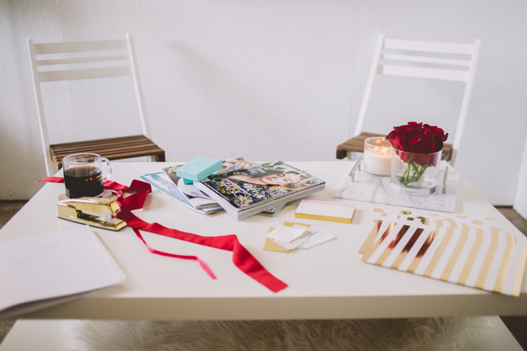 event planner table beautifully styled with red and white accents